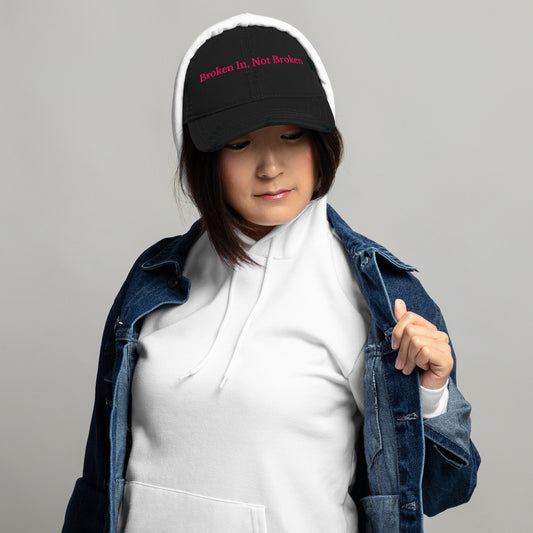 Broken In, Not Broken - Distressed Embroidered Dad Hat with vintage styling and bold resilient-inspired message on front. 