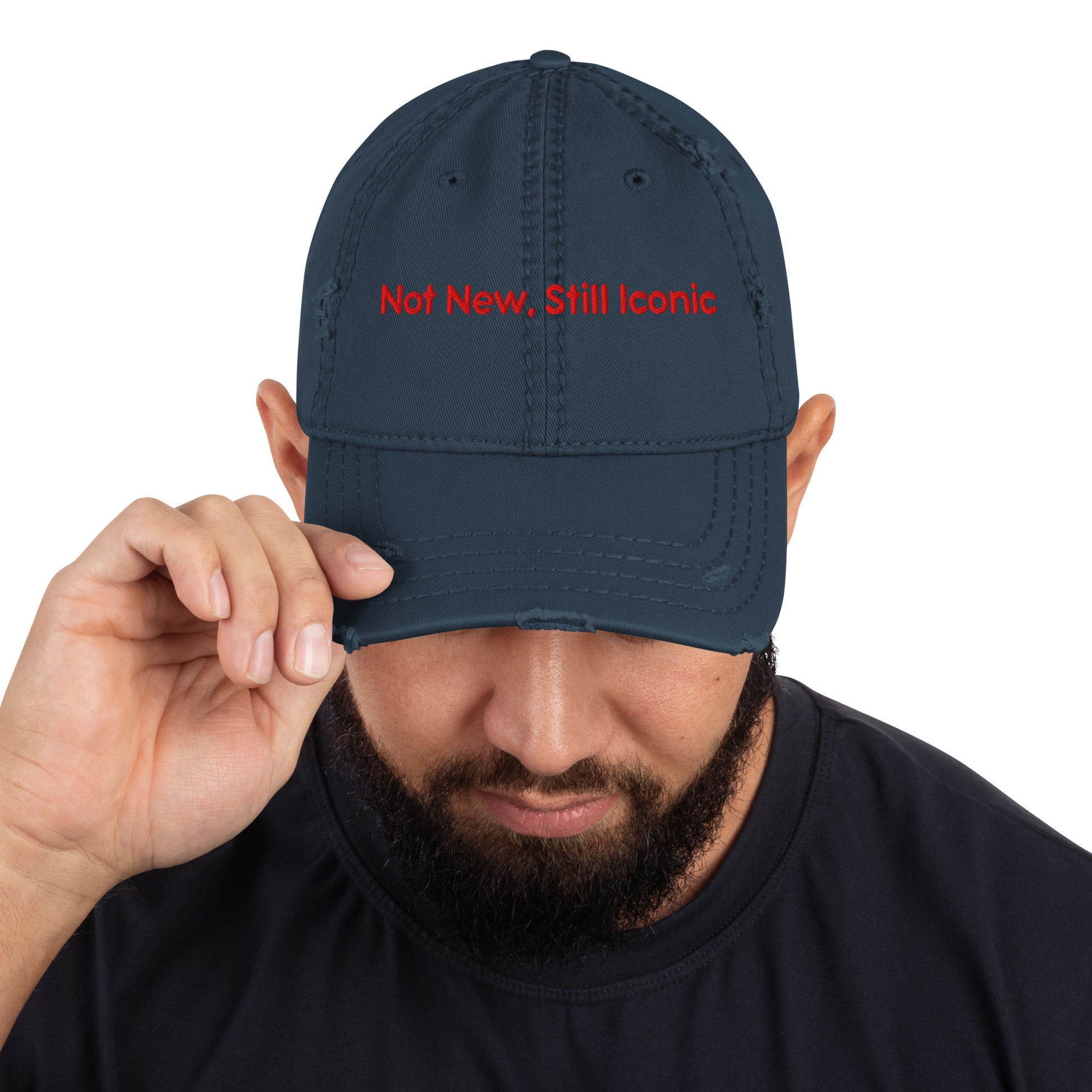 Not New. Still Iconic - Vintage - Style Distressed Dad Hat with bold embroidered text on a weathered cotton finish. 