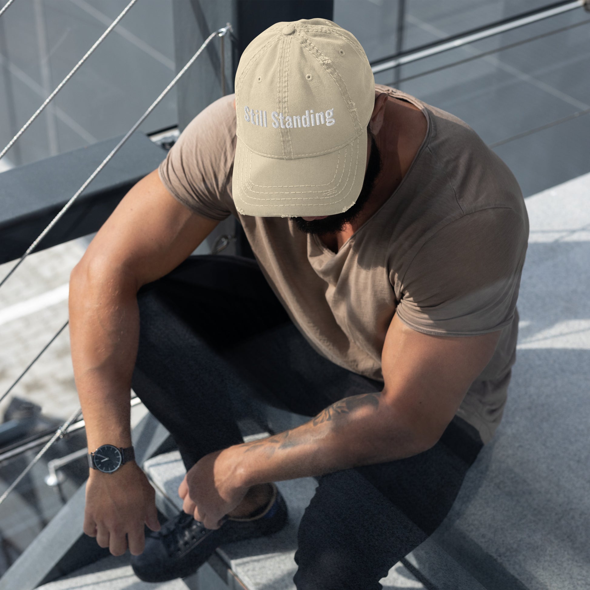 Still Standing - Resilient MessageDistressed Dad Hat- with vintage distressed design and bold embroidered lettering. 