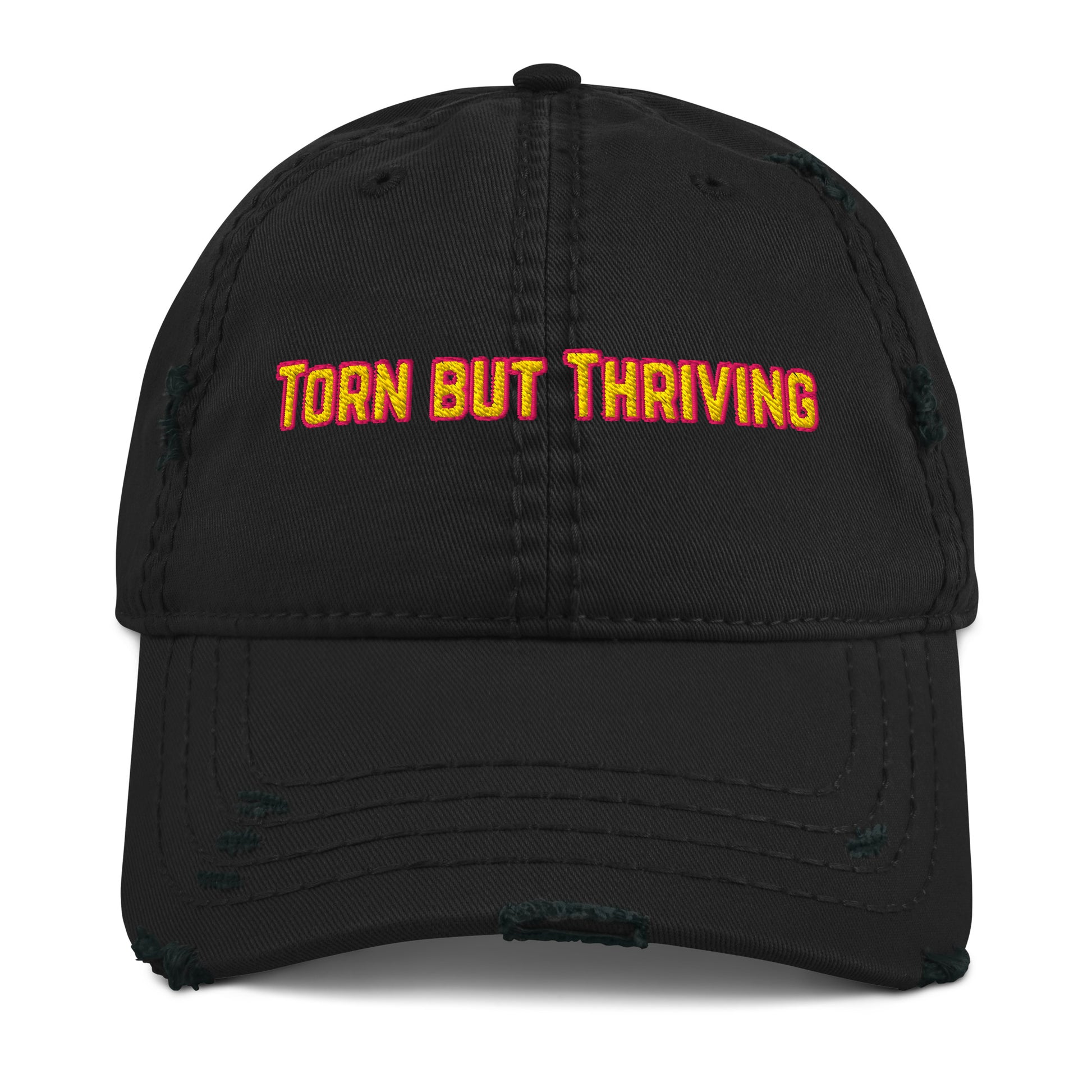 Torn but Thriving -Distressed Dad Hat- featuring rugged vintage style and uplifting message stitching on front. 